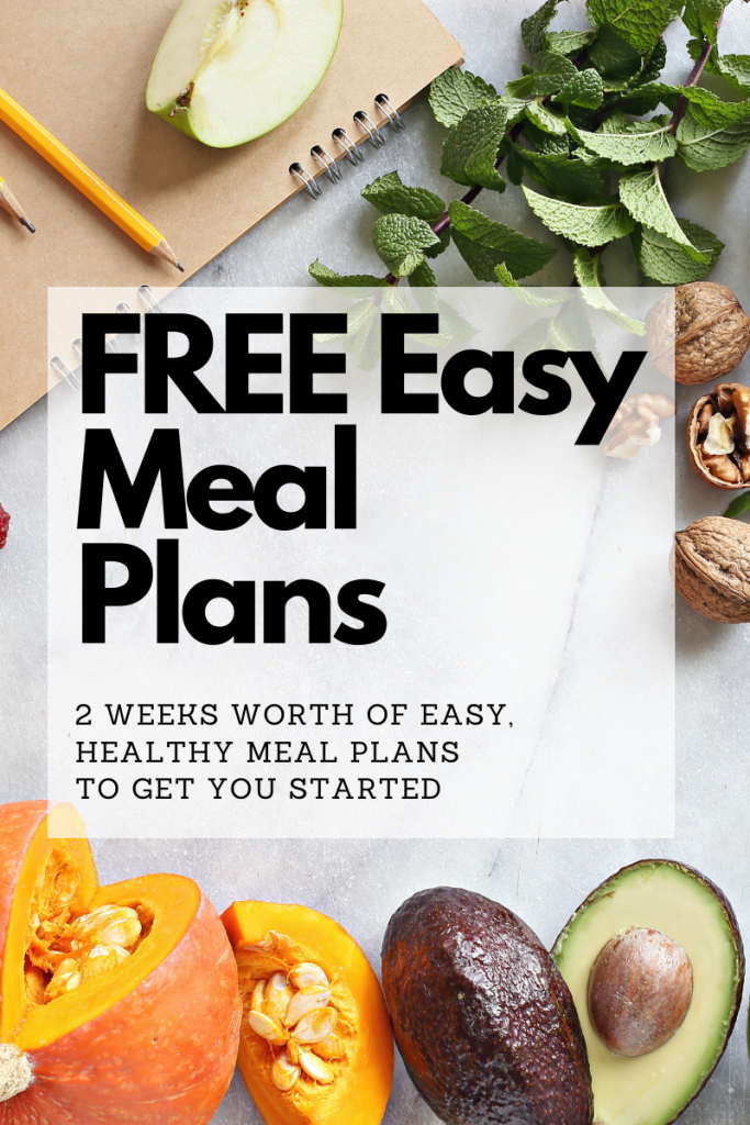 Free easy healthy meal plans for monthly meal planning on background of fresh produce and notepad with pencile