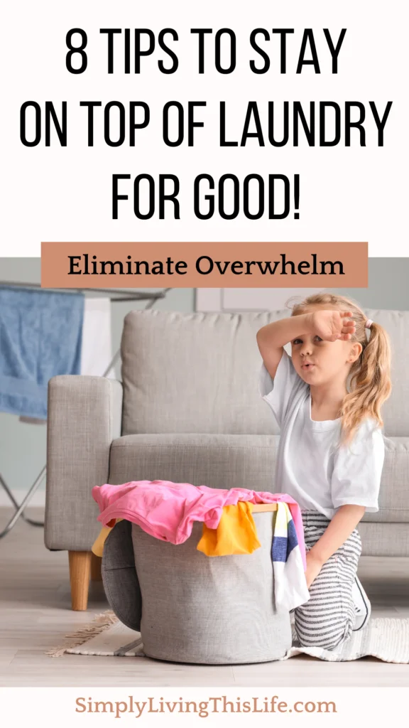 young girl looking tired sitting in front of a pile of clothes