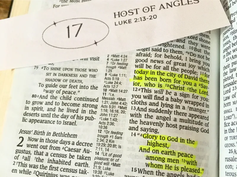 Advent Calendar printable for day 17 on Bible open to Luke chapter 2.