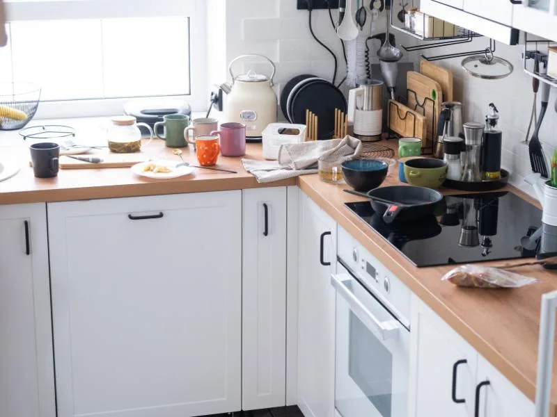 messy kitchen with dishes everywhere