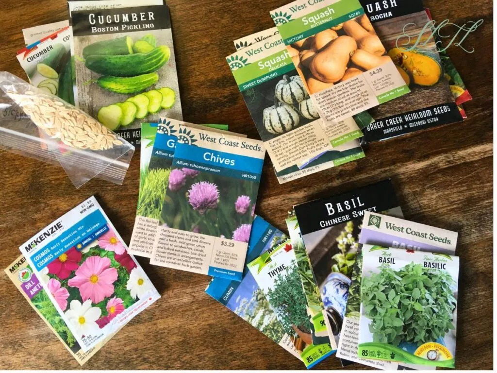 piles of seed packages on a wooden table